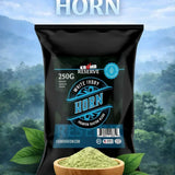 KSM-66 Reserve White Ivory Horn package with green powder in a wooden bowl against a forest background