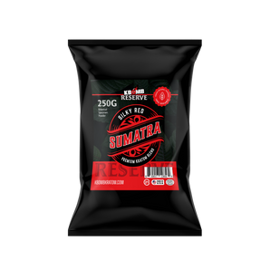 Black package of KBomb Reserve Silky Red Sumatra coffee on a white background