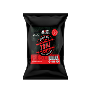 Black package of KBomb Reserve Velvet Red Thai Premium Snack Mix on a white background